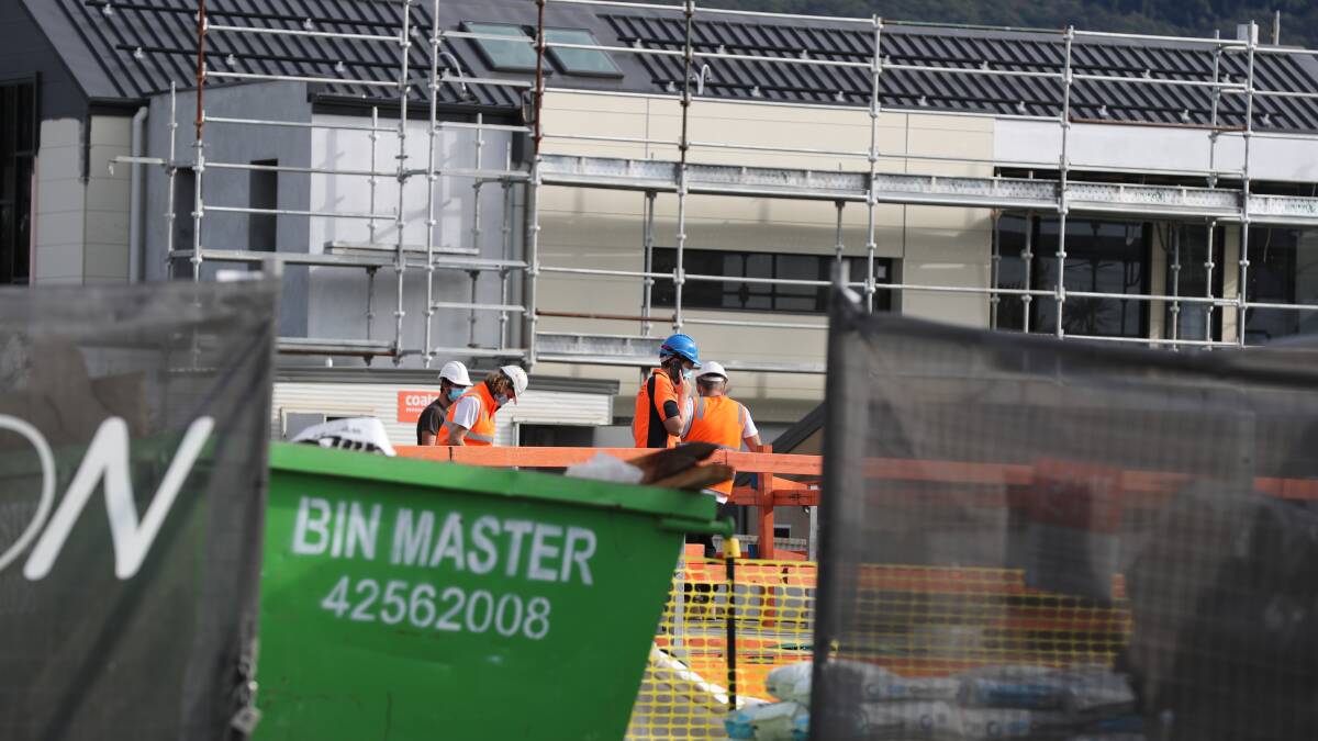 Premier defends construction shutdown as economy sours