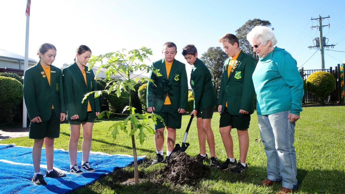 Former student Betty Cross with (from left) Zara Houley, Ruby Kerr, Ethan Bennett, Kalani Barrass and Lincoln Blanch during a tree planting to mark the school's 70th anniversary. Picture: Sylvia Liber