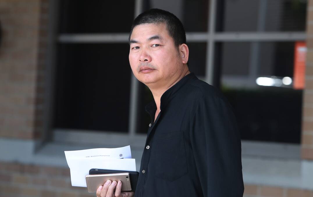 Falun Lin leaves Wollongong Police Station on Saturday.