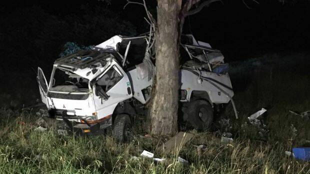 The family's Mitsubishi mobile home hit a tree after allegedly being struck from behind by a B-double at Yarra near Goulburn on Friday night. Photo: NSW Traffic and Highway Patrol Command
