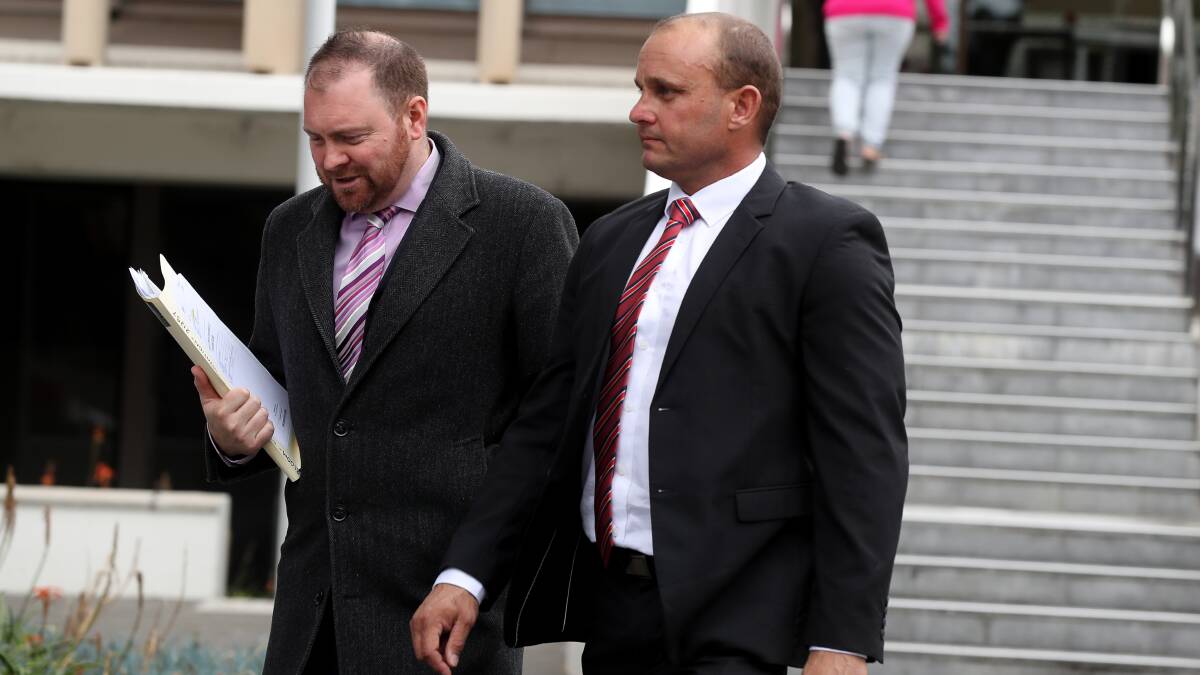 Gregory Bloom (right) outside Wollongong court in June.