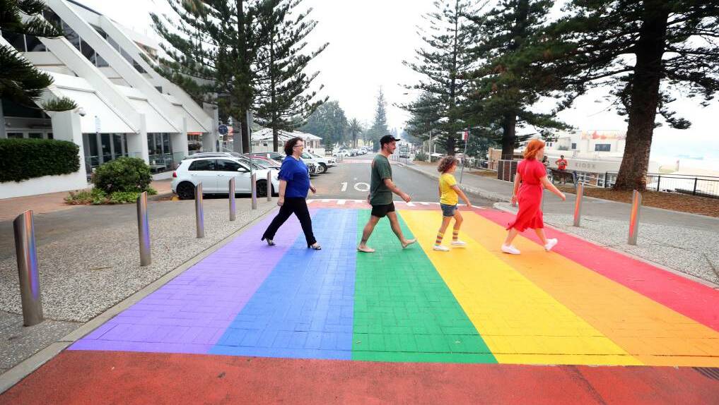  Powerful symbol: Acting lord mayor Tania Brown is joined by Brad Heffernan, Grace Johnson and Isobel Foye at the North Wollongong rainbow crossing. Picture: Sylvia Liber.