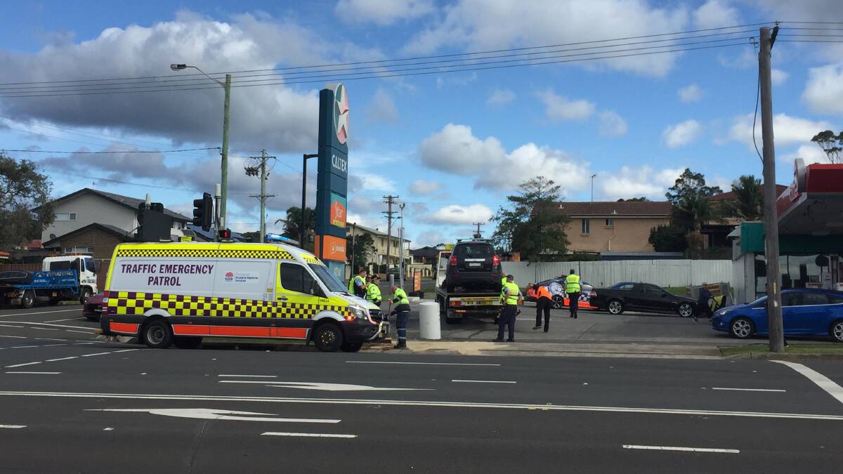 NSW Ambulance at the scene of the crash on Friday. Photos: Sylvia Liber