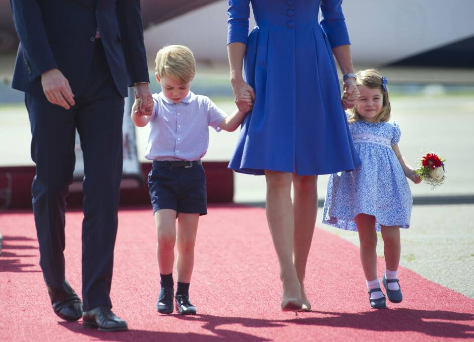 The Duke and Duchess of Cambridge and their children Prince George and Princess Charlotte. Photo: Steffi Loos/Pool Photo, AP