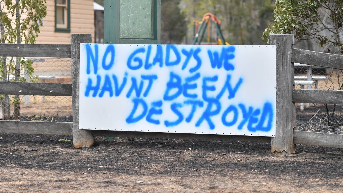 A sign shows Balmoral's fighting spirit after catastrophic bushfires swept through the Southern Highlands village. Photo: AAP
