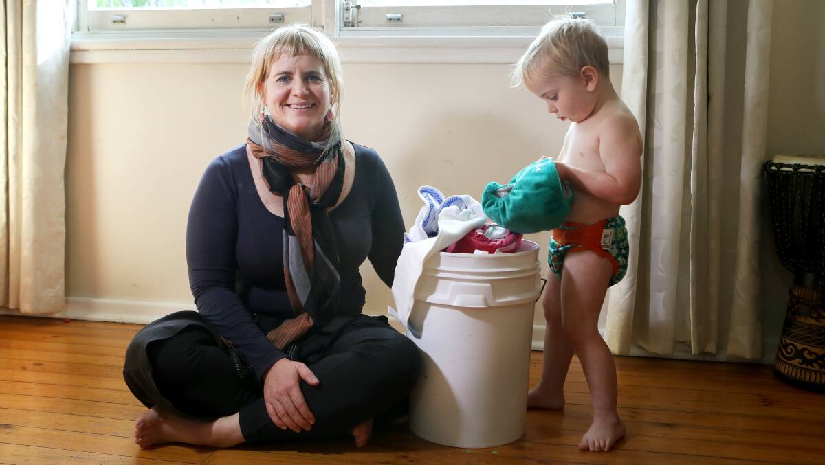 Bulli businesswoman and mum-of-three Alice Henchion, with her youngest son, Fergus, runs workshops, a nappy library and online store through her business Nappy Lane. Photos: Sylvia Liber
