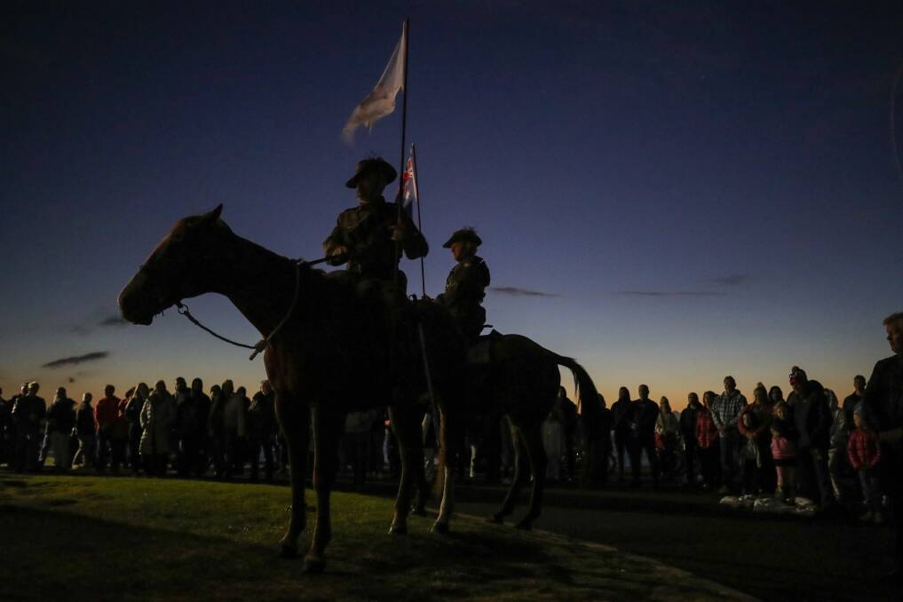 Thousands gather at Blowhole Point in Kiama for the dawn service. Photo: Adam McLean