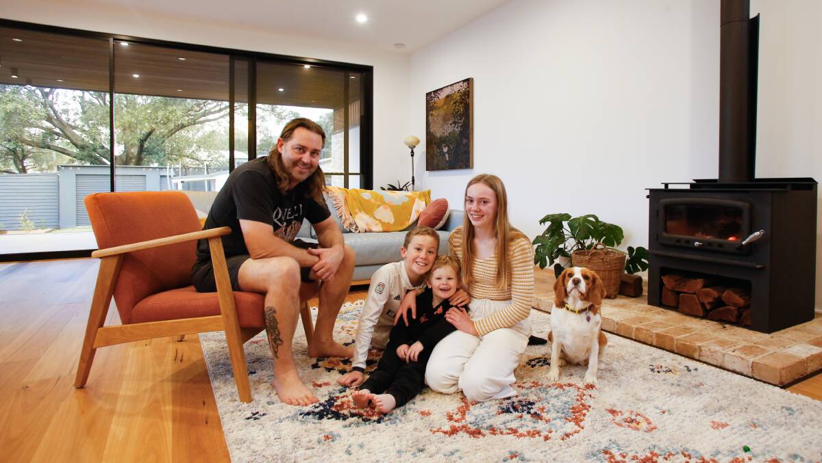 Heath Whiddon with his three kids Evie, Miles and Archie and their dog Luna. Picture: ANNA WARR