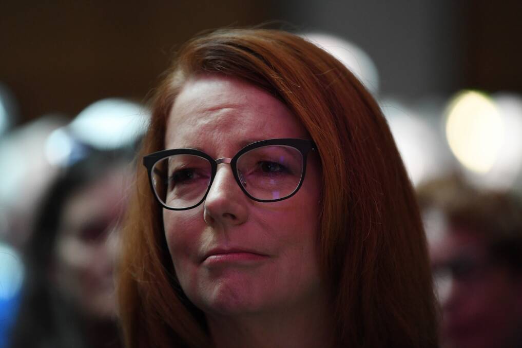 Former Australian prime minister Julia Gillard reacts during the national apology. Photo: Lukas Coch, AAP