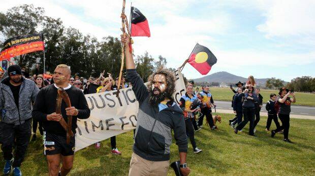 Clinton Pryor approaches the Aboriginal Tent Embassy and the end of his walk. Photo: Alex Ellinghausen
