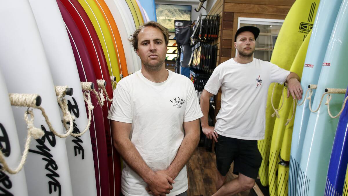 Devastated: Parrish and Taylor Bryne, owners of Byrne Surfboards in Thirroul. Photos: Anna Warr.