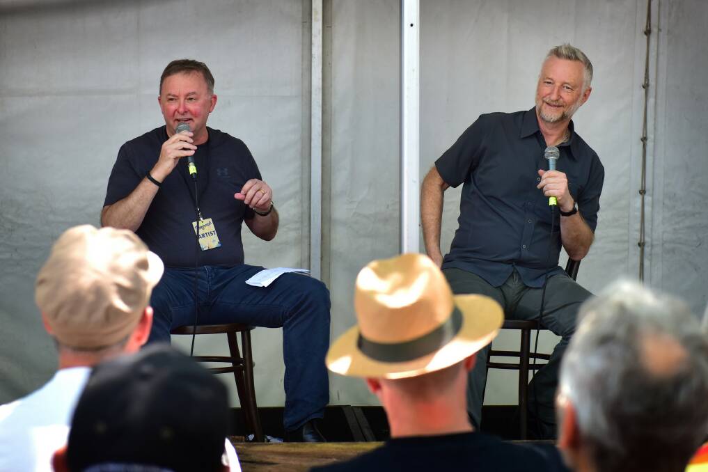 Singer-songwriter Billy Bragg talks politics with Anthony Albanese. For all the photos from Fairgrounds visit www.illawarramercury.com.au Picture: Brad Liber