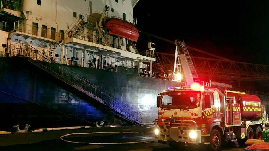 Fire crews worked day and night to contain a blaze on a Port Kembla cargo ship in 2018.
