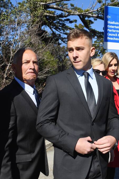 Callan Sinclair, right, leaves Wollongong Local Court last month. Photo: AAP