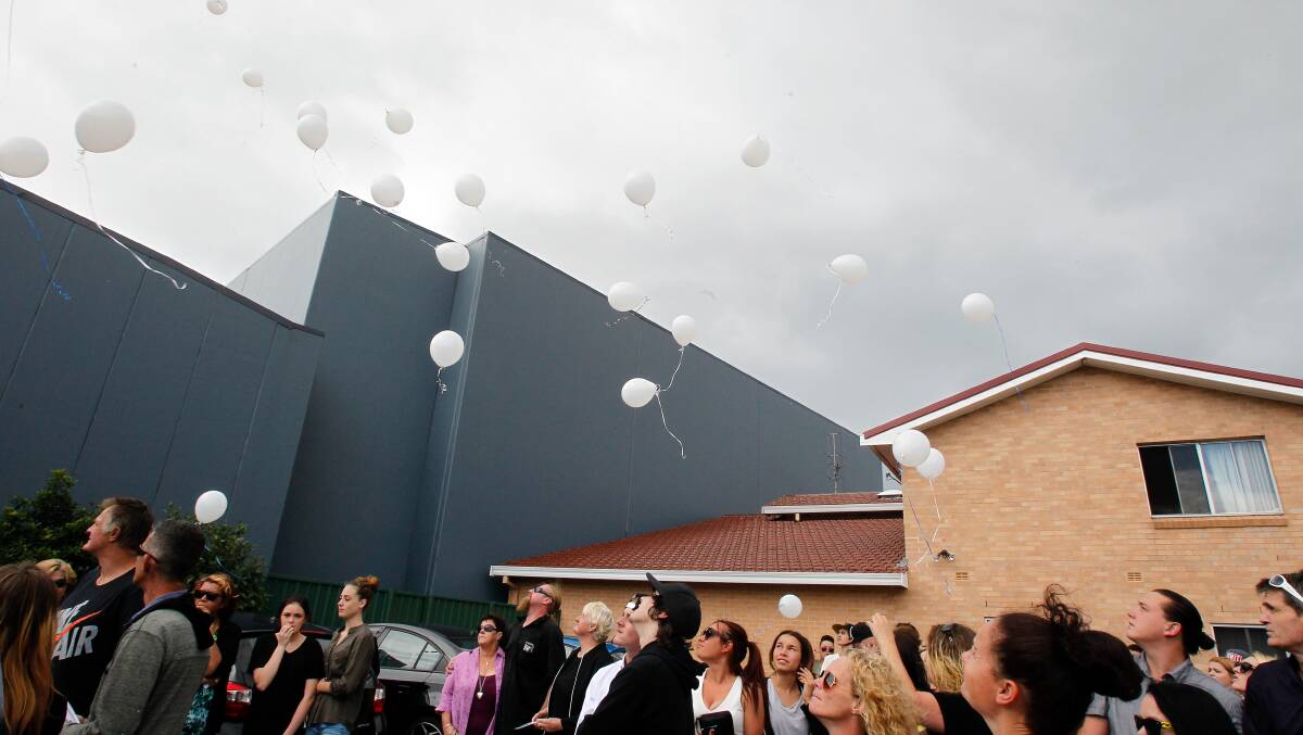 Mourners sent white helium balloons into the sky at Jye McWatters' funeral.