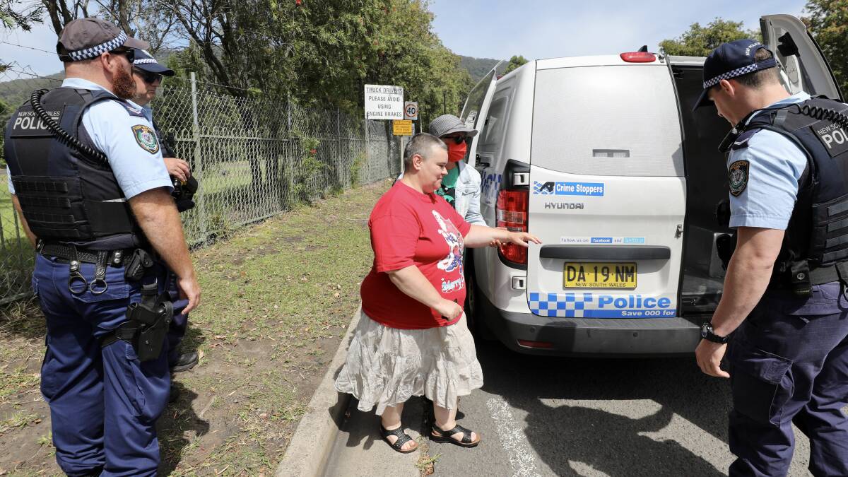 Dapto grandmother chains herself by the neck to coal mine gates