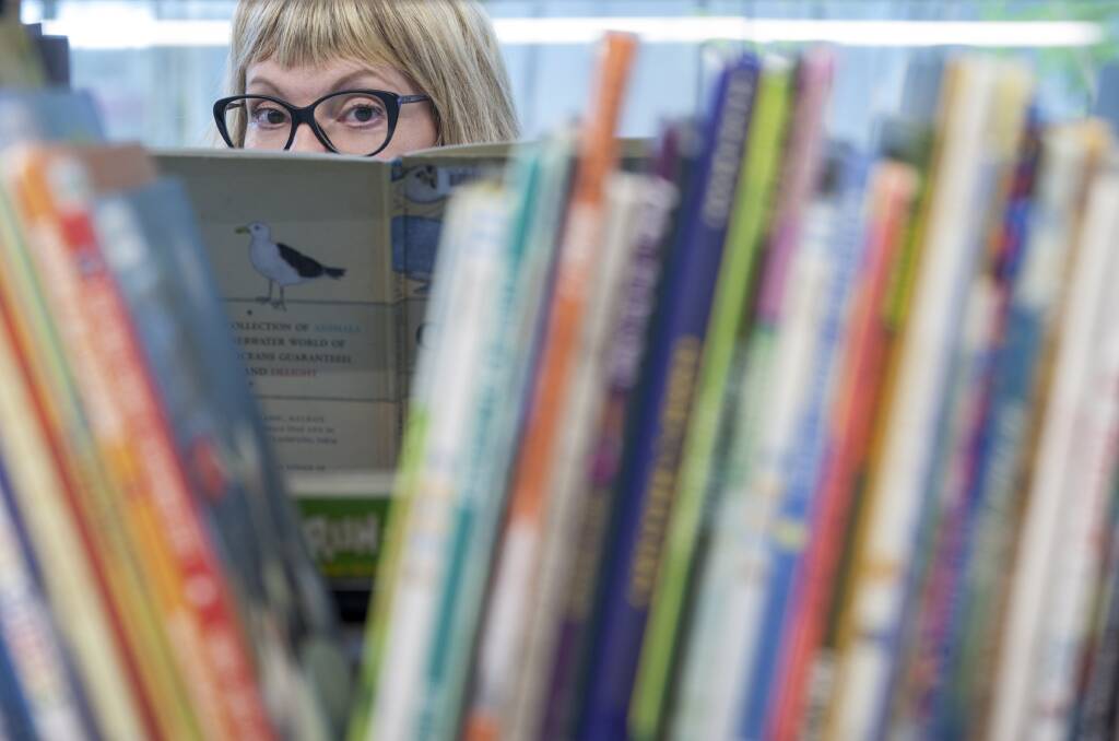 Australians make about 114 million visits to public libraries each year. Photo: Jennifer Soo