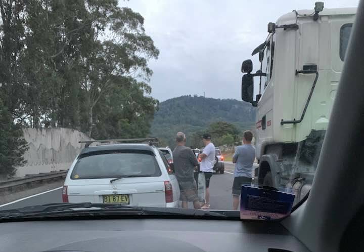 "Been sitting at the bottom of Mt Ousley since 5am due to an accident," Craig Ford posted on Facebook.
