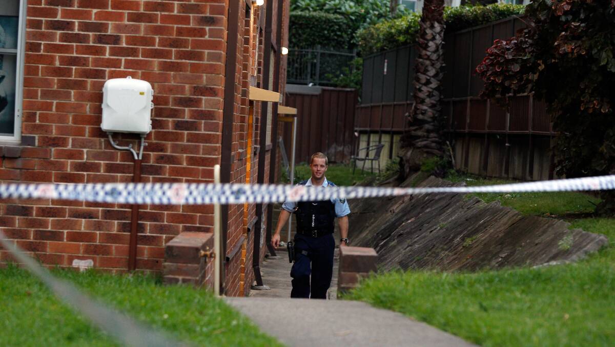 A crime scene is established at the North Wollongong apartment block after the stabbing.