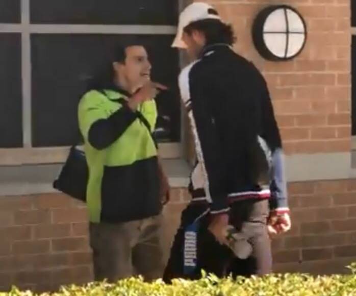 Angry: The Mercury captured video footage of the dying stoush between Brent Douglas and his rival, Caleb Long, outside Wollongong Police Station.
