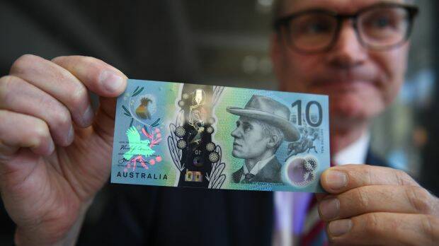 Reserve Bank assistant governor Lindsay Boulton with the new $10 note. Photo: Louise Kennerley
