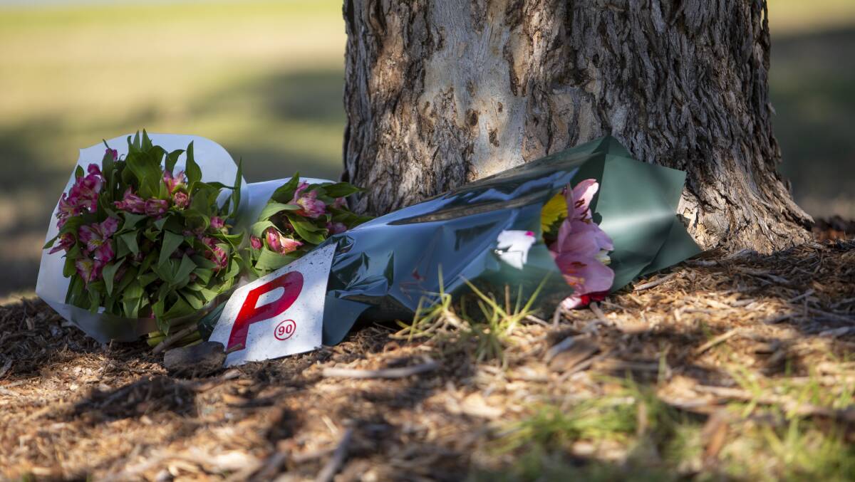 A floral tribute for Enrico on Lakeside Drive. Photo: Anna Warr