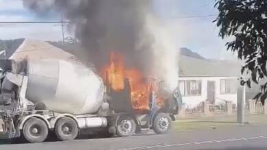 A cement truck on fire on Gladstone Avenue in Coniston on Friday. Photo: Jason Lovstad