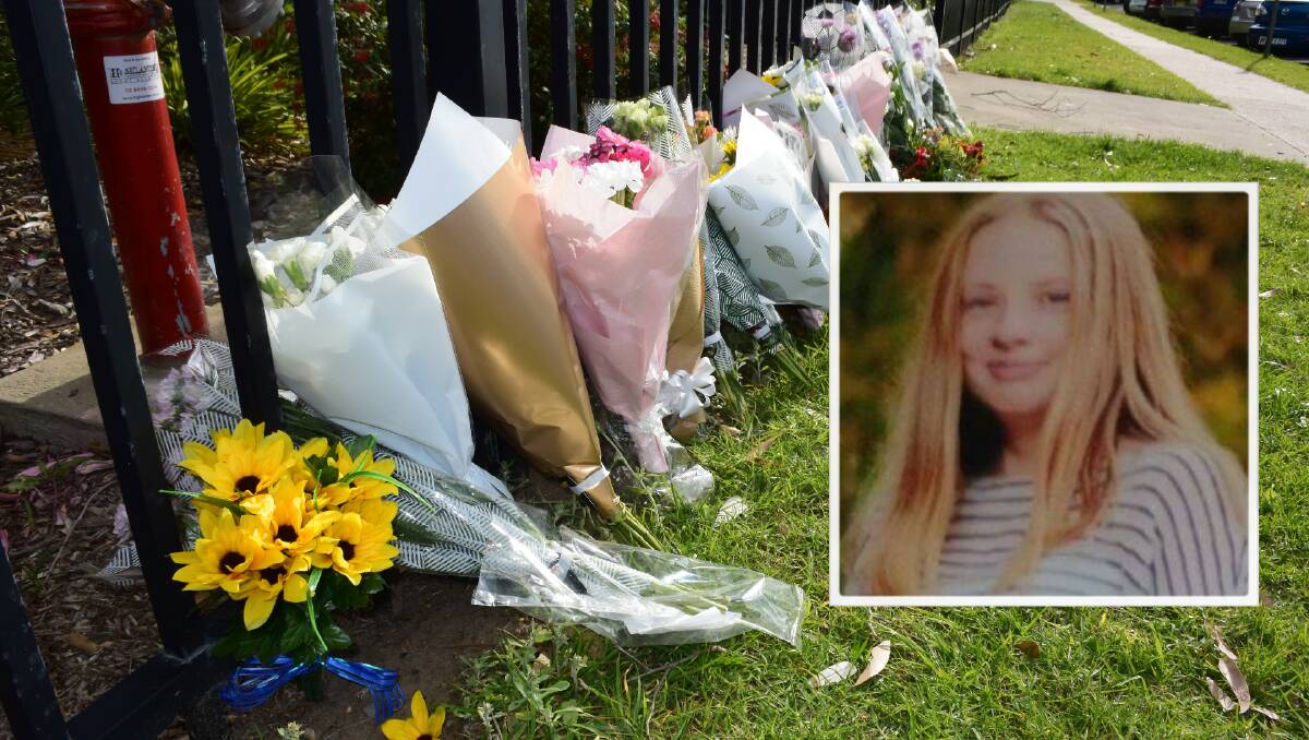 Tributes to Zoie (inset) placed outside Ulladulla High School on Thursday. 