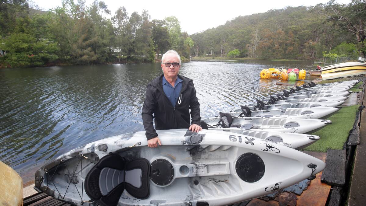 Geoff Hughes with a new fleet of ride-on kayaks he introduced in 2018. Picture: Chris Lane