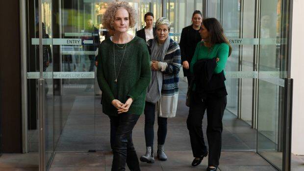 Members of the class action against Johnson & Johnson, Gai Thompson, Joanne Maninon and Carina Anderson, leave the Federal Court on Tuesday. Photo: AAP
