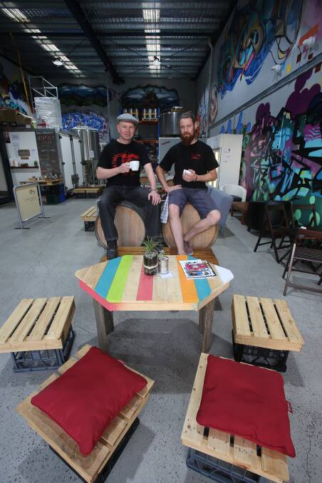 Michael Peloquin - with Kieran Revell-Reade - takes a break from setting up his brewery. 