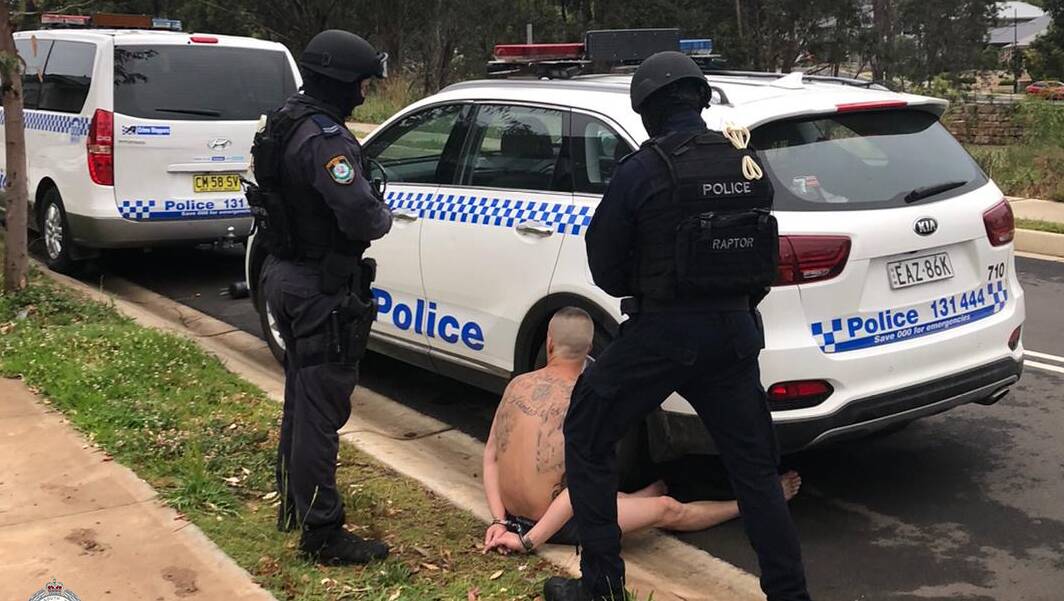 A man is arrested in Cambelltown on Thursday. Photo: NSW Police