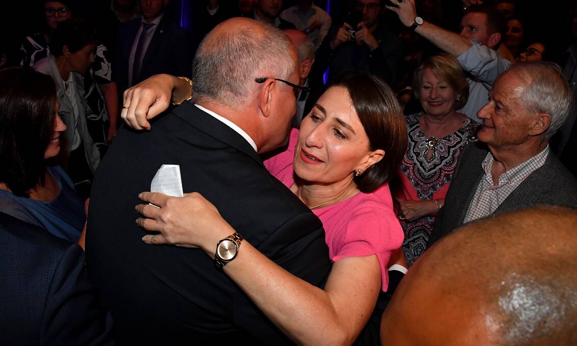 NSW leader Gladys Berejiklian celebrates her party's state election victory with Prime Minister Scott Morrison. Photo: AAP