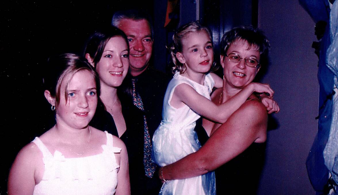 Maurice and Rhonda Higgins with Carlie (left), Chloe and Lisa two years before the accident.