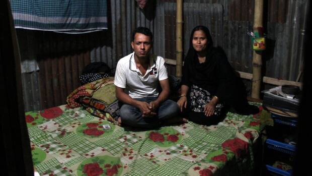 Forhad Mia and wife Raifa worked for $65 a month in a factory used by Kmart in 2013. They said their salaries were too low to live on. Photo: Ben Doherty