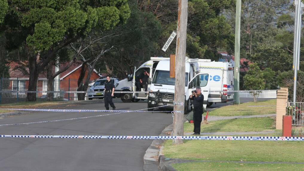  Police in Unanderra in the hours after Nathan Costello was shot and killed on February 14, 2018. Picture: Robert Peet