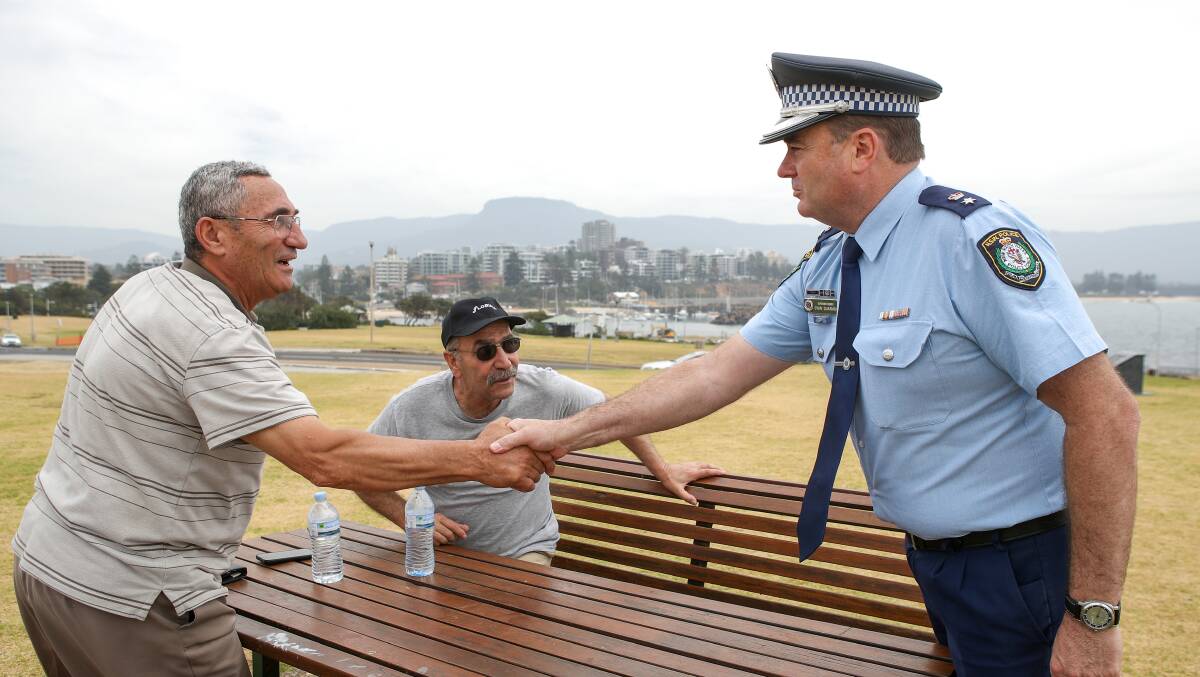 People person: Supt Quarmby is trying to get out and meet residents, including Bill El Bacha and George Jacob at Flagstaff Hill, Wollongong. Picture: Adam McLean