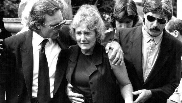 Ebony's parents Peter and Christine Simpson are supported by friends and family as they leave Bowral court in 1993. Picture: file. 