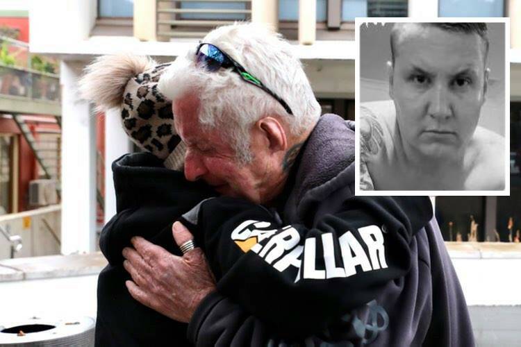 Nathan Costello's father, Robert, hugs his daughter-in-law Louisa Kinchela outside Wollongong court on Thursday after hearing his son's killer will spend 15 years behind bars. Photo: Adam McLean