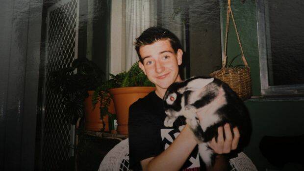 Paul loved animals and rescued his pet rabbits during the Canberra bushfires in 2003. Photo: Supplied
