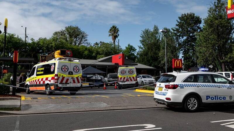 An on-duty ambulance officer was fatally stabbed outside a Sydney fast food restaurant. Picture by AAP