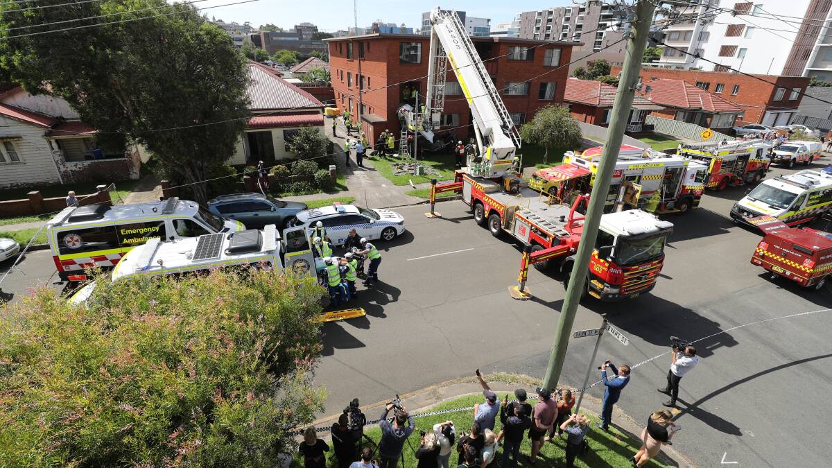 Chaos as cars somersault into Wollongong unit block