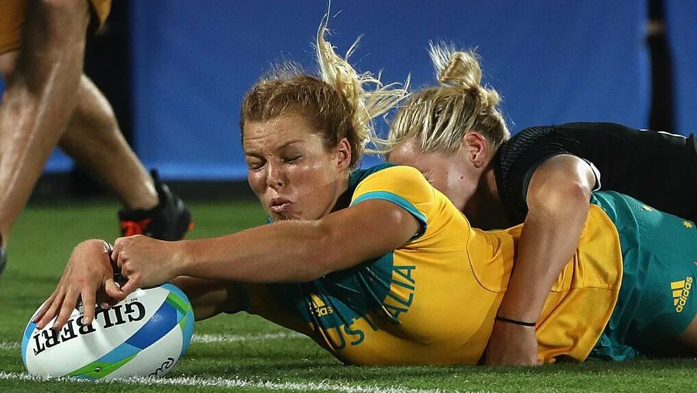 Emma Tonegato scores a try during the Women's Gold Medal Rugby Sevens match. Picture: Getty