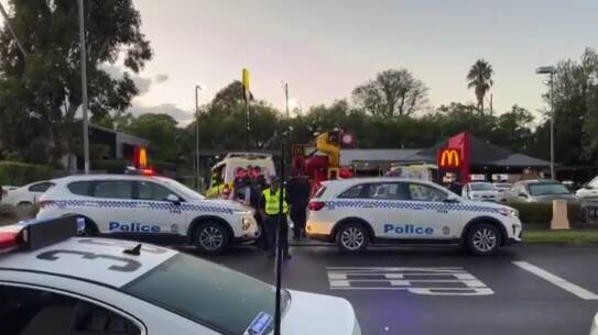 A man has been arrested after a fatal stabbing attack outside McDonald's Cambelltown. Picture Nine News