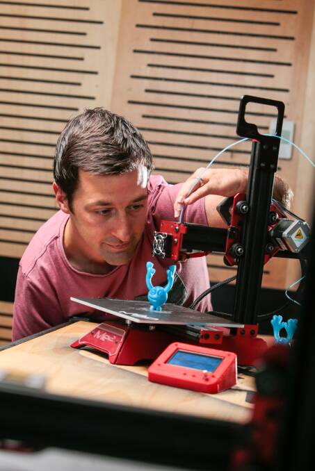Me3D founder Matt Connelly with his simple 3D printer, which can be used to teach kids as young as six about the technology. Photo: Adam McLean.