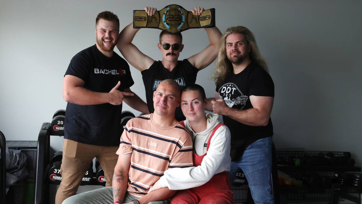 Jacob Purcell, his wife Maddi and local wrestlers Bachelor, Moses and Hunter PS Hayes (AKA Wollongong-based promoter Luke Potter). Picture by Sylvia Liber