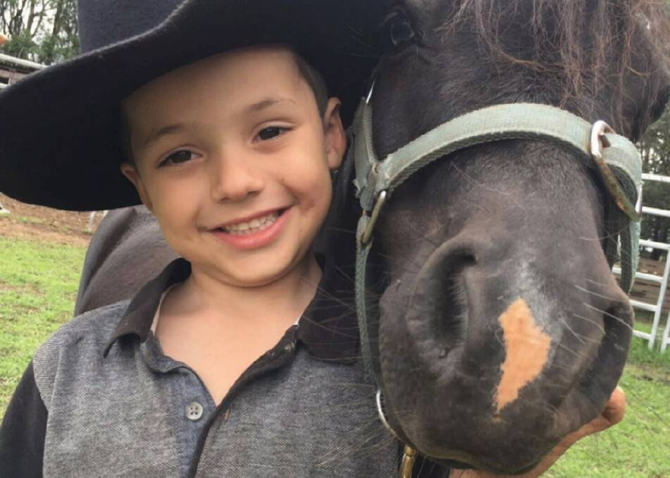 Harrison Sproule, pictured with his pony. Picture: Nine News