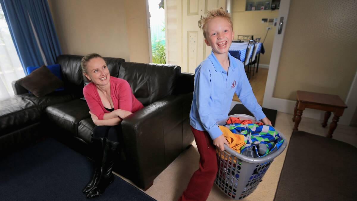Ramona Kastrup insists her son Sebastian, 8, does chores around the house. Photo: Wayne Taylor