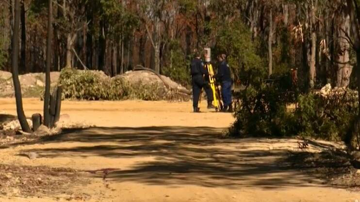 Police at the scene of the accident on a 4WD drive track off Heathcote Road. Picture: 9 News
