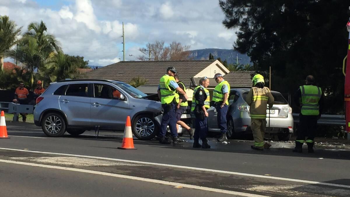 Emergency services at the scene of the Princes Highway collision. Photo: Robert Peet